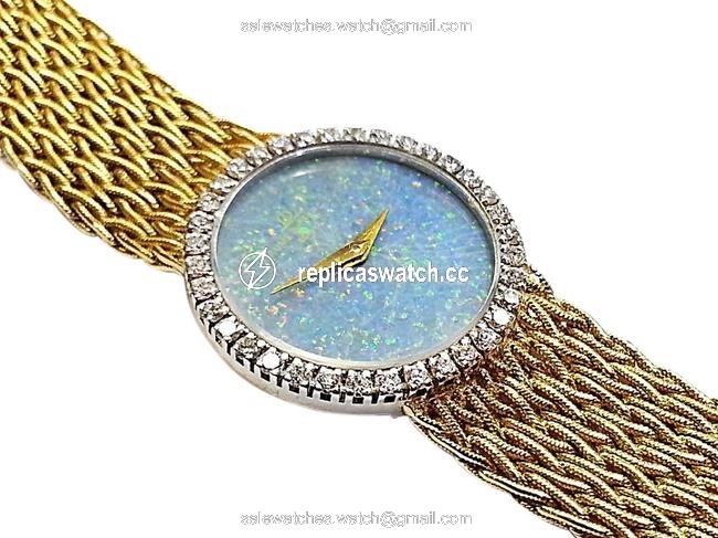 Baume & Mercier 18 Karat Yellow Gold with 36 Diamonds 0.75 Ct.tw. Opal Dial Watch Baume & Mercier 18 Karat Yellow Gold with 36 Diamonds 0.75 Ct.tw. Opal Dial Watch