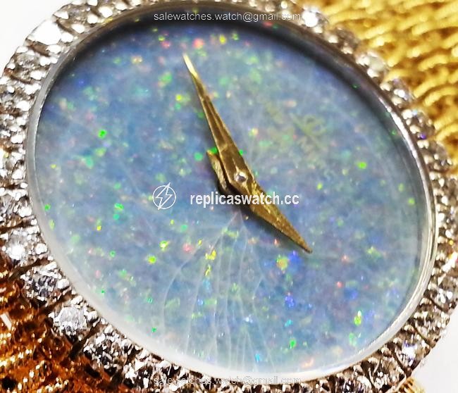 Baume & Mercier 18 Karat Yellow Gold with 36 Diamonds 0.75 Ct.tw. Opal Dial Watch Baume & Mercier 18 Karat Yellow Gold with 36 Diamonds 0.75 Ct.tw. Opal Dial Watch