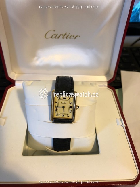 Cartier Gold W/Black Alligator Band. Blue Dial. Black Roman Numerals Tank Solo Small Watch Cartier Gold W/Black Alligator Band. Blue Dial. Black Roman Numerals Tank Solo Small Watch