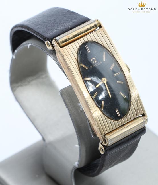 Omega Black/ Gold Vintage 14kt Rectangular Watch Omega Black/ Gold Vintage 14kt Rectangular Watch
