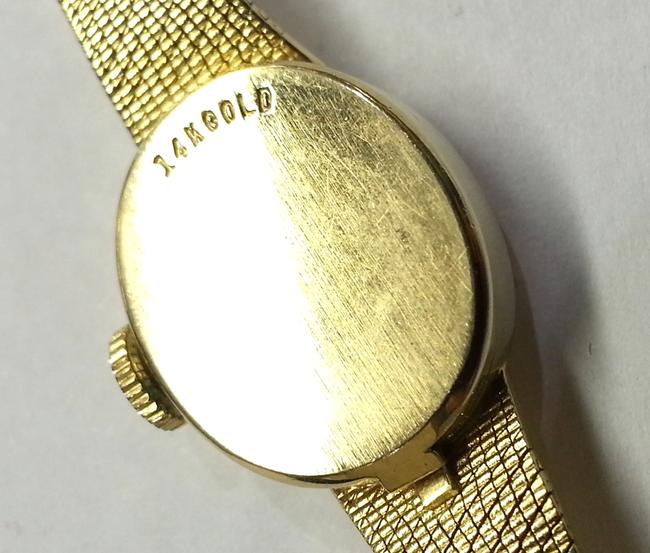 Omega Vintage 14 Karat Yellow Gold Mechanical Movement Watch Omega Vintage 14 Karat Yellow Gold Mechanical Movement Watch