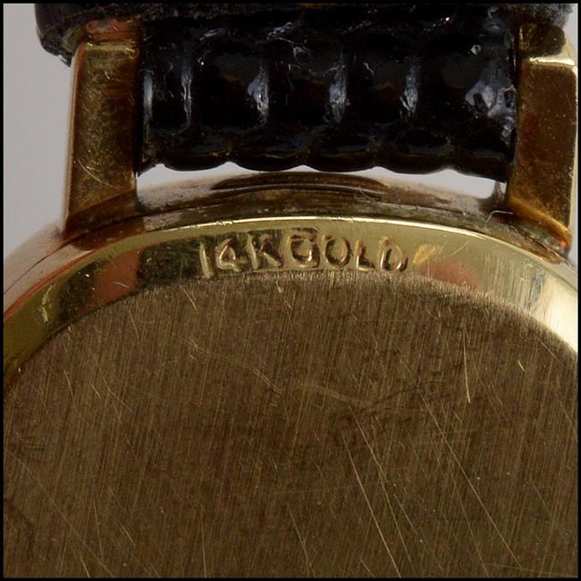 Baume & Mercier Gold/Brown Rdc11240- Tiffany Co. Vintage 14k Wristwatch Watch Baume & Mercier Gold/Brown Rdc11240- Tiffany Co. Vintage 14k Wristwatch Watch