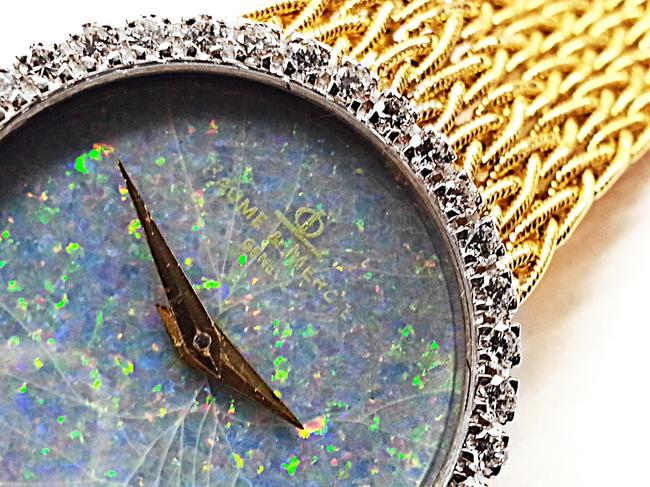 Baume & Mercier 18 Karat Yellow Gold with 36 Diamonds 0.75 Ct.tw. Opal Dial Watch Baume & Mercier 18 Karat Yellow Gold with 36 Diamonds 0.75 Ct.tw. Opal Dial Watch