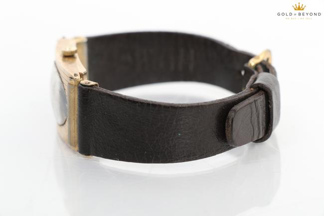 Omega Black/ Gold Vintage 14kt Rectangular Watch Omega Black/ Gold Vintage 14kt Rectangular Watch
