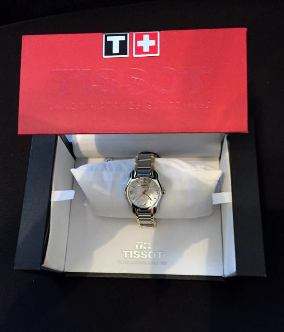 Tissot Two-tone Silver and Gold Swiss Made T-wave Round Womens with White Mother Of Pearl Face. T0232102211700 Watch Tissot Two-tone Silver and Gold Swiss Made T-wave Round Womens with White Mother Of Pearl Face. T0232102211700 Watch