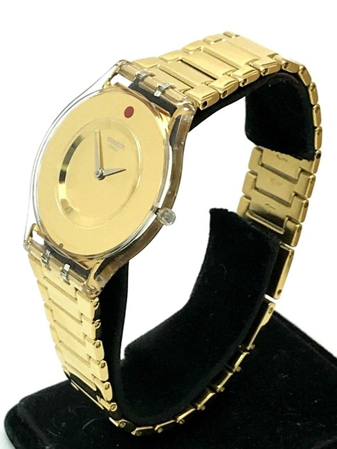 Swatch Yellow Gold Sfk399g Skin Punto Rosso Womens Swiss Quartz Analog Watch Swatch Yellow Gold Sfk399g Skin Punto Rosso Womens Swiss Quartz Analog Watch