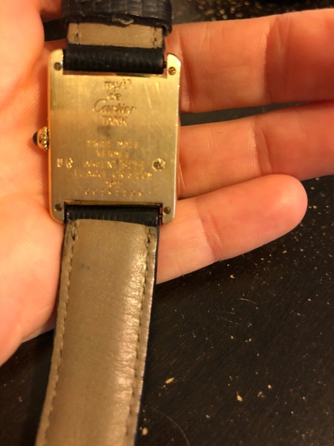 Cartier Gold W/Black Alligator Band. Blue Dial. Black Roman Numerals Tank Solo Small Watch Cartier Gold W/Black Alligator Band. Blue Dial. Black Roman Numerals Tank Solo Small Watch