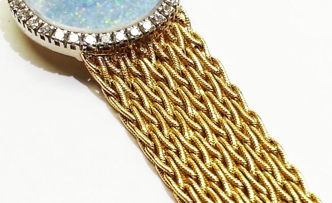 Baume & Mercier 18 Karat Yellow Gold with 36 Diamonds 0.75 Ct.tw. Opal Dial Watch
