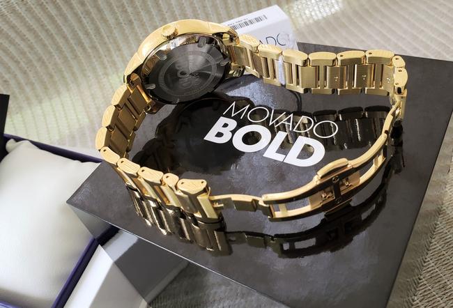 Movado Gold Round Dial Watch