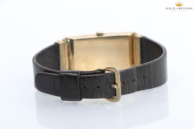 Omega Black/ Gold Vintage 14kt Rectangular Watch Omega Black/ Gold Vintage 14kt Rectangular Watch