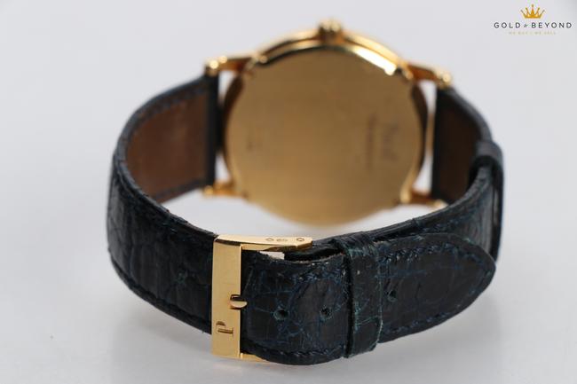 Piaget Gold/White Altiplano Ribbed 34mm 18kt Watch Piaget Gold/White Altiplano Ribbed 34mm 18kt Watch