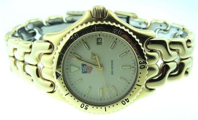 TAG Heuer Sport Elegance S94.713m Gold Tone Date 34mm Watch TAG Heuer Sport Elegance S94.713m Gold Tone Date 34mm Watch