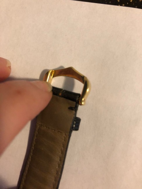 Cartier Gold W/Black Alligator Band. Blue Dial. Black Roman Numerals Tank Solo Small Watch Cartier Gold W/Black Alligator Band. Blue Dial. Black Roman Numerals Tank Solo Small Watch